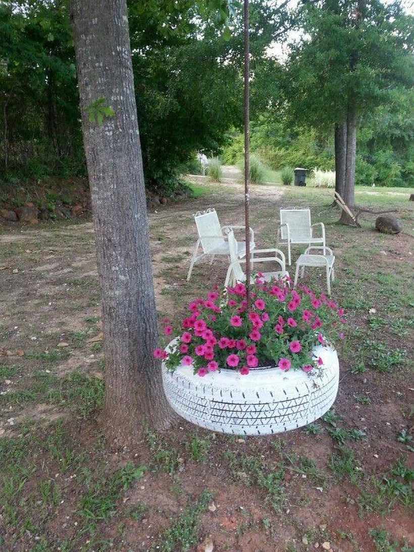 old tire hanging planter