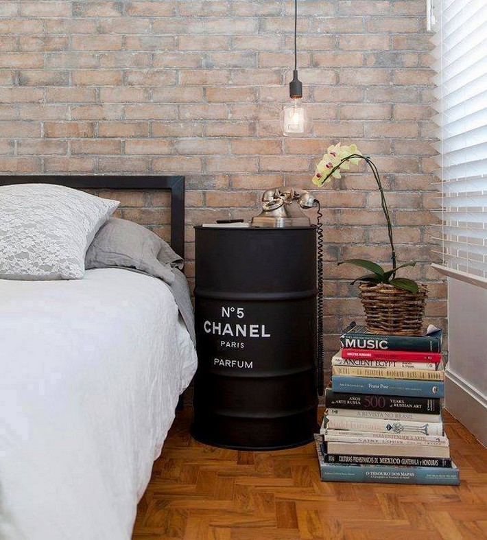 reused metal drum as bedside table